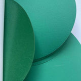 Adhesive backed round green sandpaper